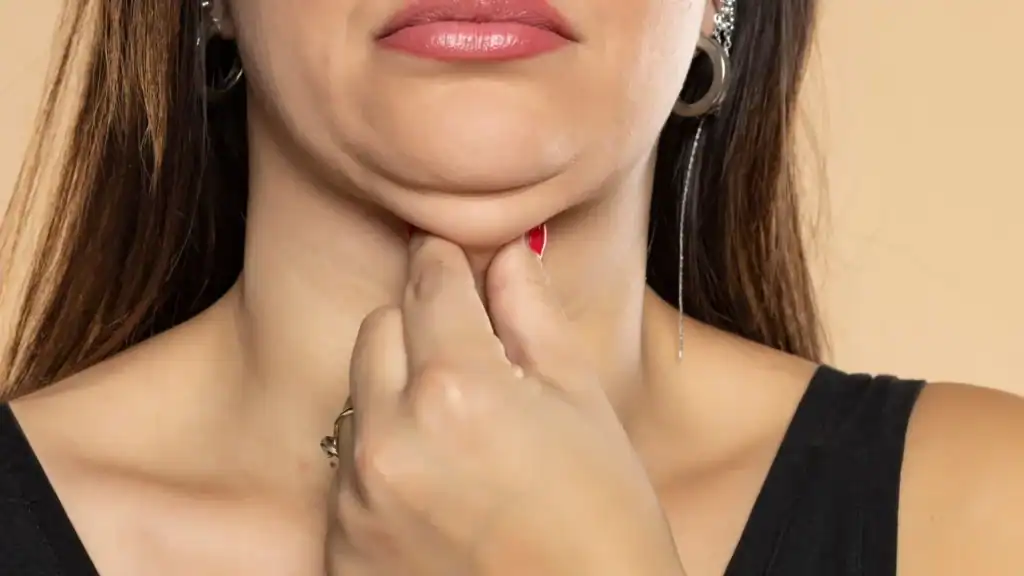 An image of a woman with double chin, sad, worried : Non Surgical Double Chin Removal Treatment in Wraysbury, UK